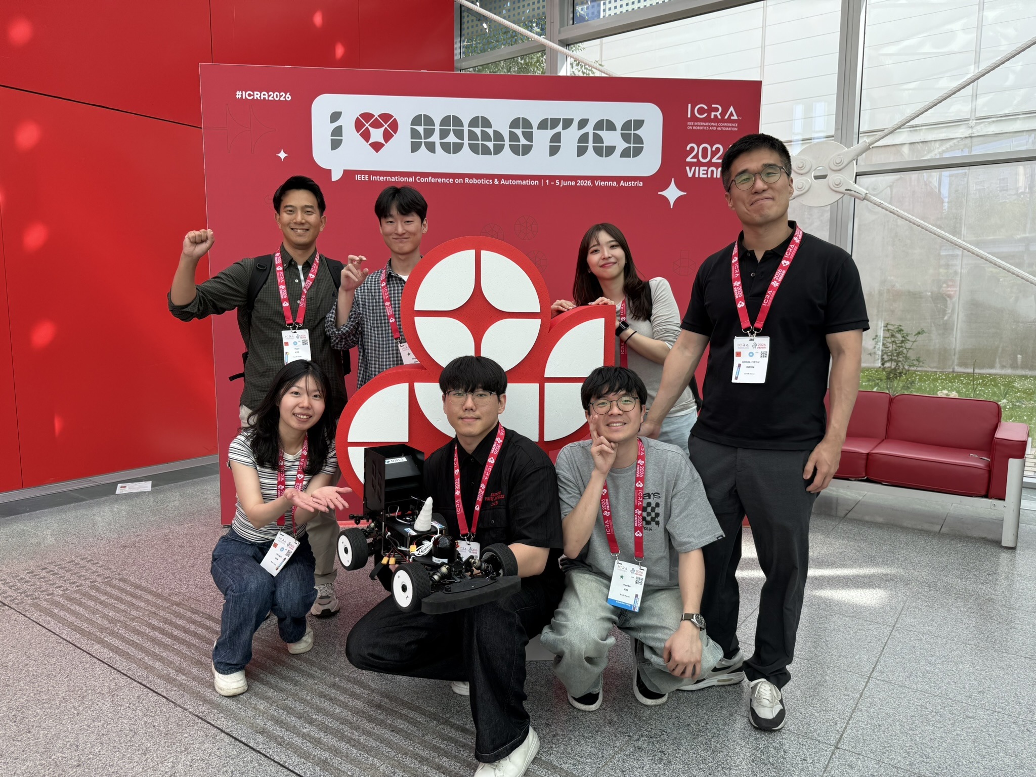UNICORN Racing Team with the car at the ICRA 2026 backdrop