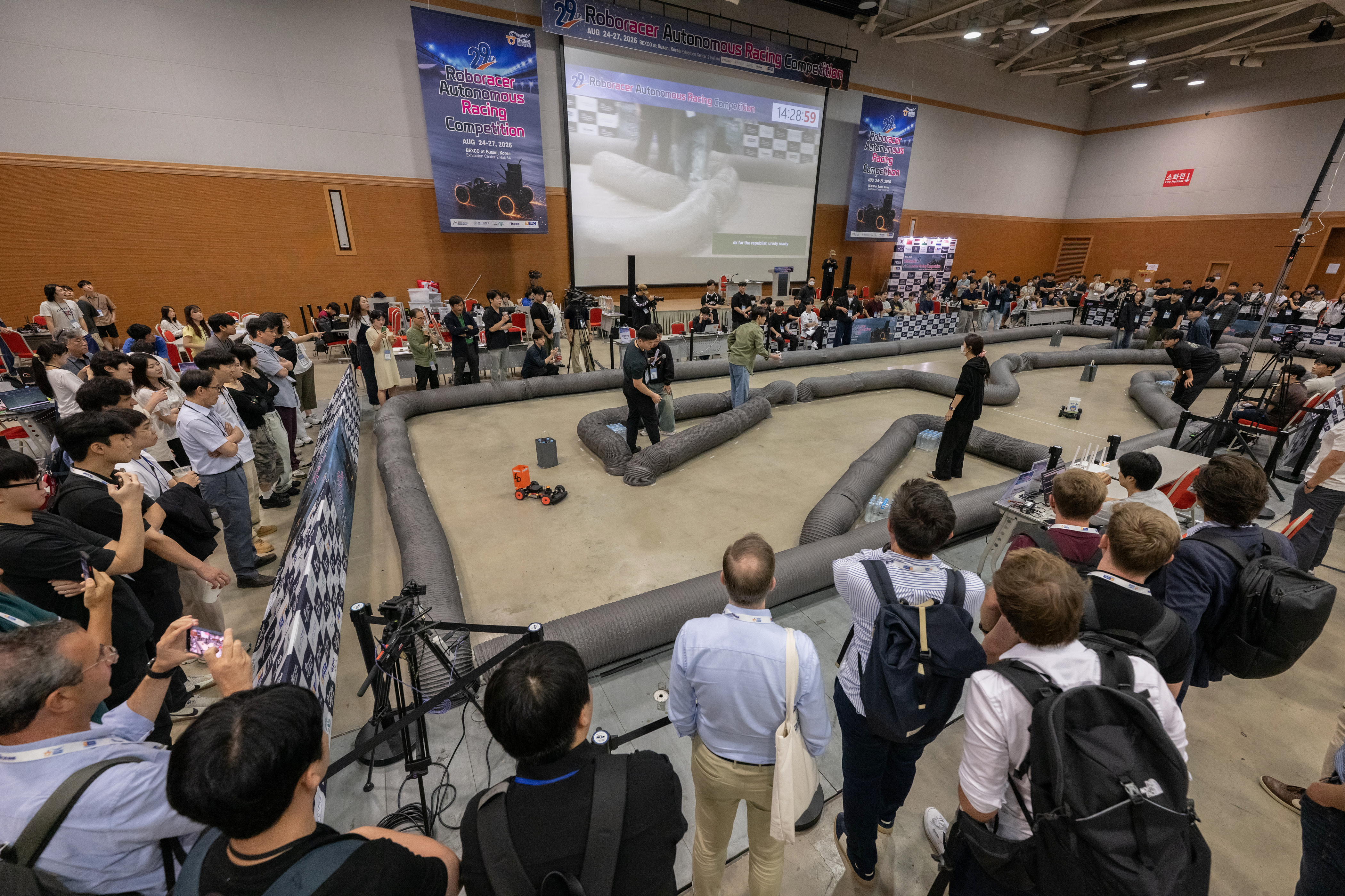 Audience watching the autonomous racing competition